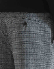 Pantaloni chino con fantasia a quadri