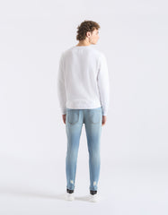 Jeans skinny fit con strappi