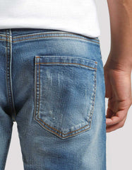 Jeans skinny fit con strappi