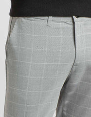 Pantaloni chino con fantasia a quadri