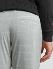 Pantaloni chino con fantasia a quadri