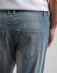 Jeans slim fit con strappi