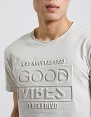 T-shirt with embossed print
