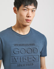 T-shirt with embossed print