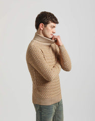 Maglia collo alto con treccia