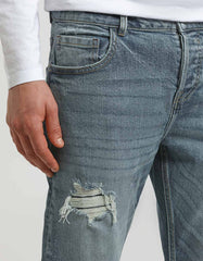 Jeans regular fit con strappi