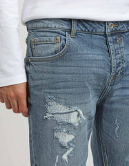 Jeans regular fit con strappi