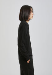 Polo manica lunga con bottoni|Colore:Nero