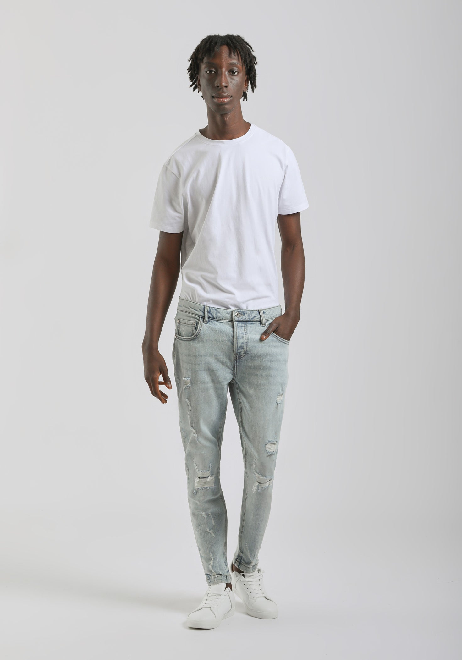 Jeans skinny fit con strappi|Colore:Jeans