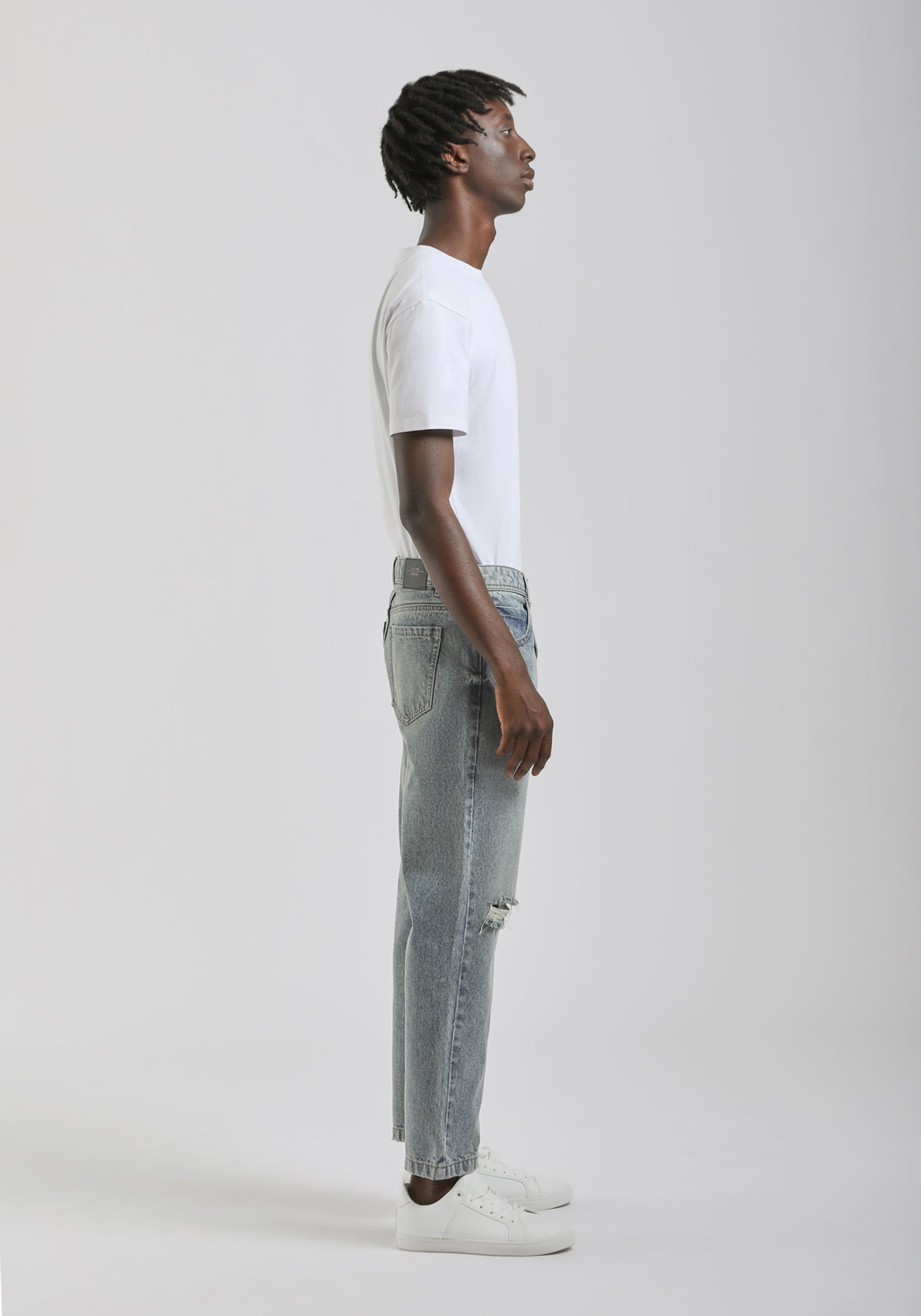 Jeans slim fit con strappi|Colore:Jeans