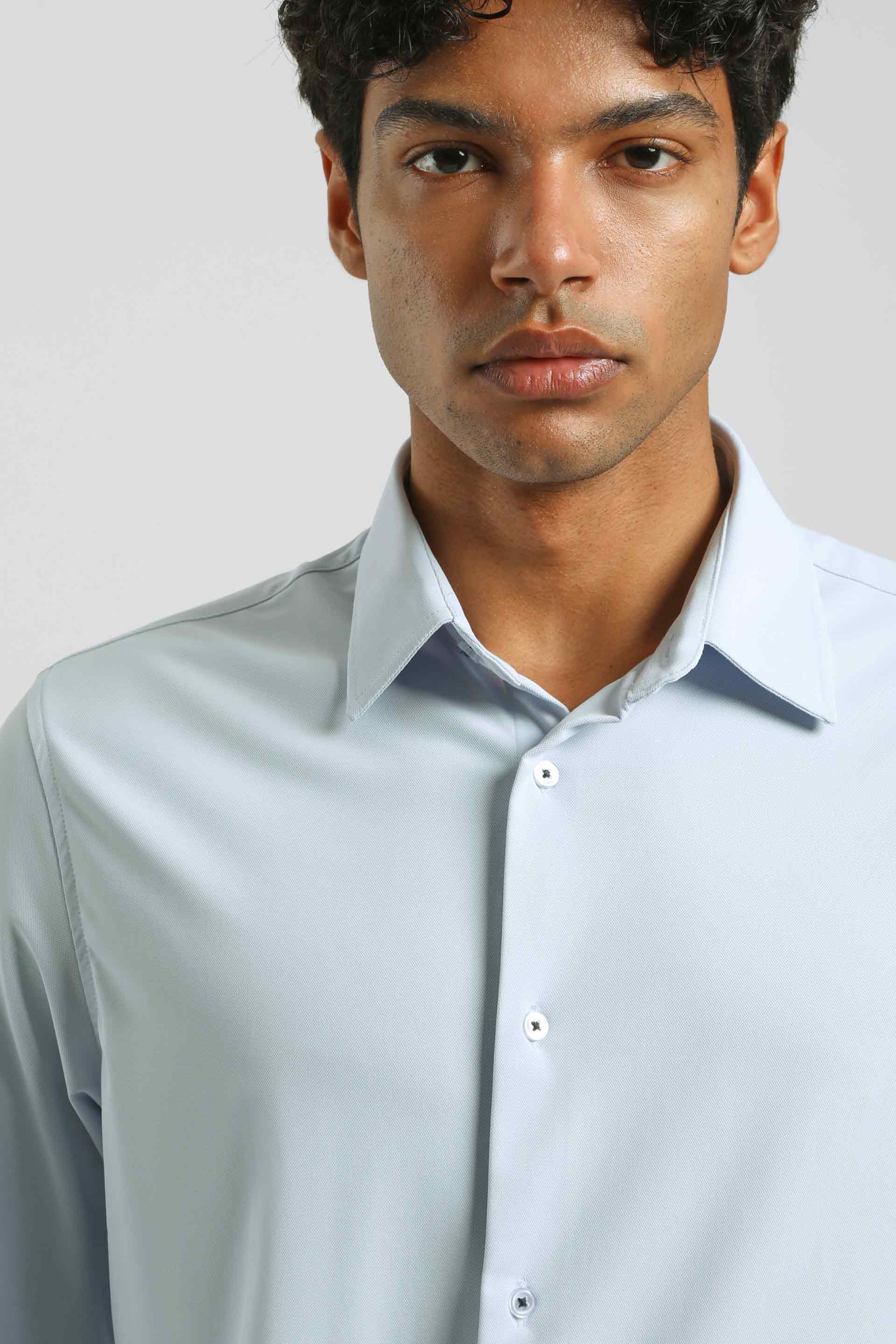 Camicia tinta unita in tessuto elastico|Colore:Cielo